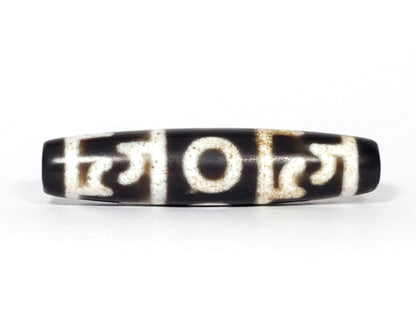 N-062226-GRRP, face B, dharma wheel and scroll implements, very dark brown agate, sandy-cream lines, unretouched