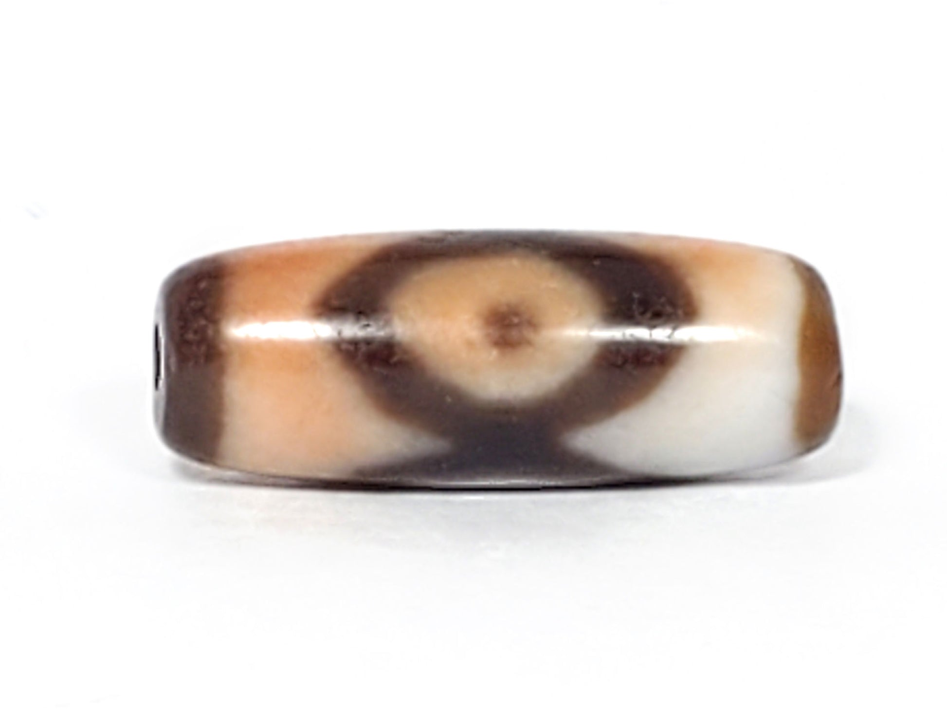 N-062226-3E, three eye agate dzi, 26.2×9.8mm, face A, peach-orange and dark brown eye on warm ground, unretouched