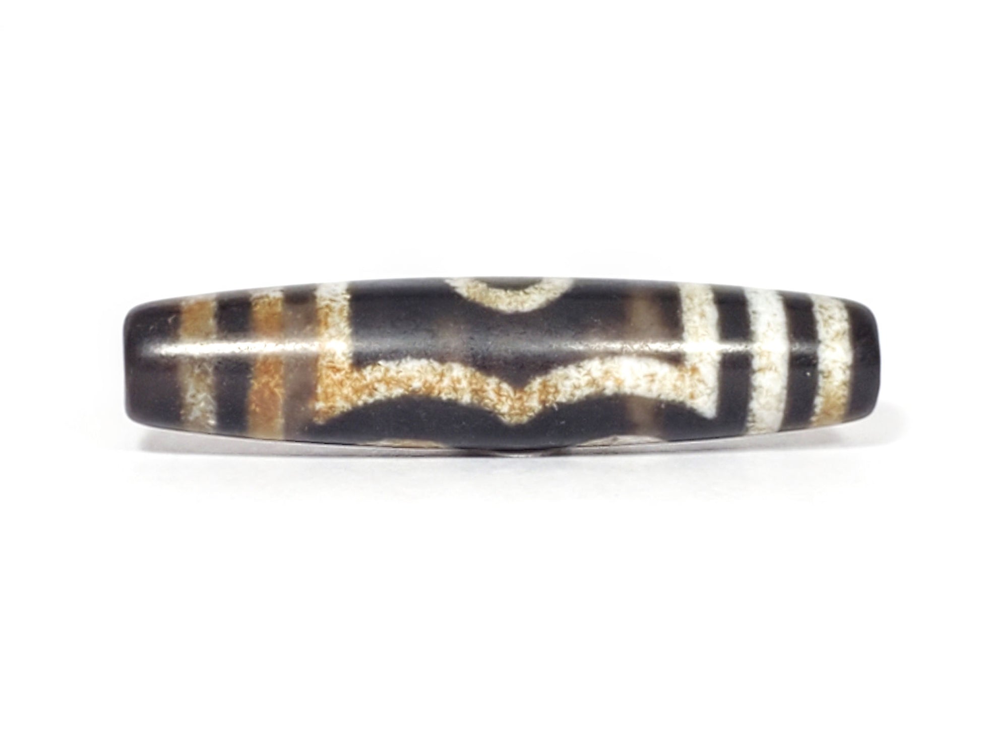 N-062426-3E2 three eye dzi 57.9x13.3mm Face B wave connector warm rust-brown banding near-black ground unretouched