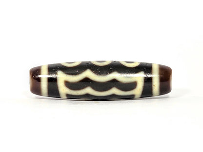 Five-eye dzi bead, dark brown agate, white wave & eye motifs, elongated oval shape, smooth polished surface, 41mm