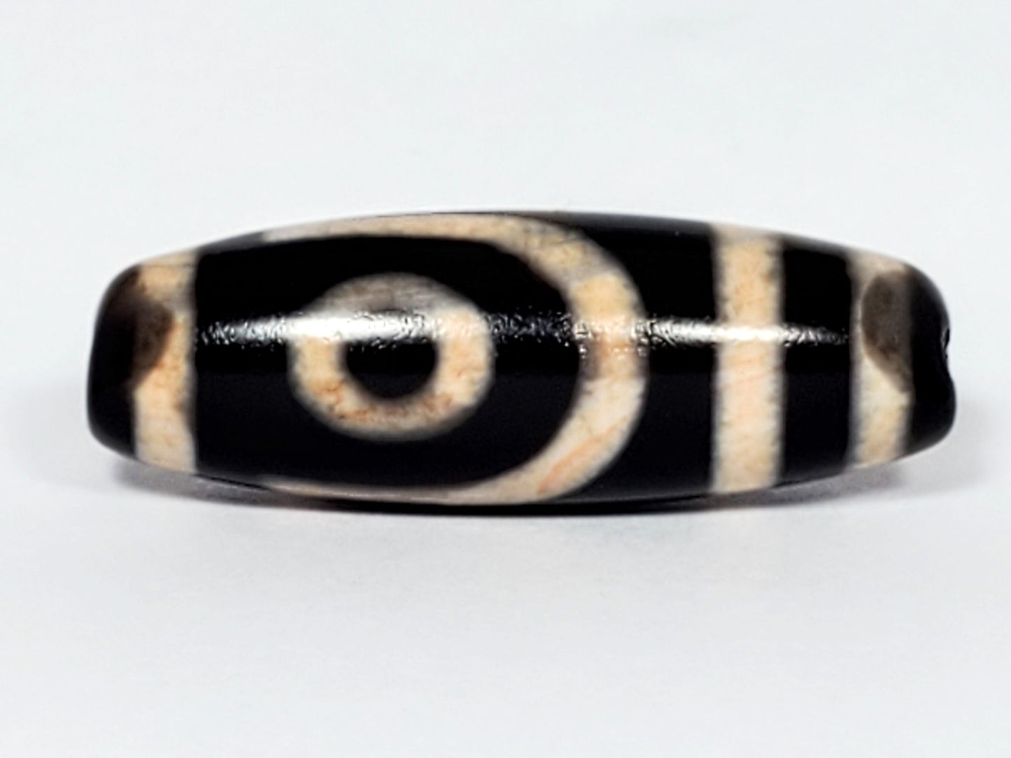 N-062426-2E new two eye dzi 37.7x13.0mm Face A open C-ring eye pitch-black ground peach-cream motif unretouched