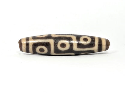 Ancient Tibetan nine eye dzi bead — original 1000-year-old natural agate, unretouched photo