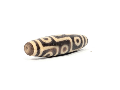 Tibetan dzi bead with eye motif pattern in cream and brown agate, drilled focal bead