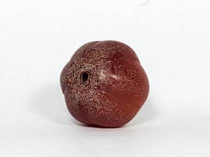 Ac-061126-PKP Bead A second face, dense surface crazing, smooth rib peaks contrasting crazed valleys, unretouched