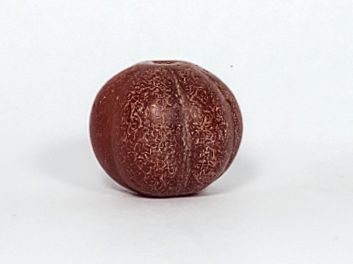 Ac-061126-PKP Bead A drill hole face, small off-centre bore, surface crazing radiating from hole, unretouched