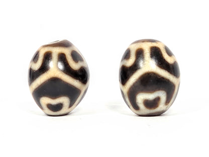 Pair of Round Tibetan Dzi Beads featuring the Six Eye Lotus Motif (R-SiEL-010326)