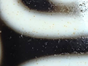 Rare Ancient Round Tibetan Dzi Bead featuring the Nine Eye Motif and Bloodspots (121725)