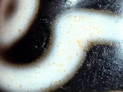 Rare Ancient Round Tibetan Dzi Bead featuring the Nine Eye Motif and Bloodspots (121725)