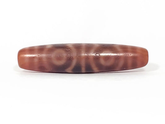 At-082624-6EBS, Face C with two closed eyes, warm beige-cream rings, matte aged surface texture, unretouched