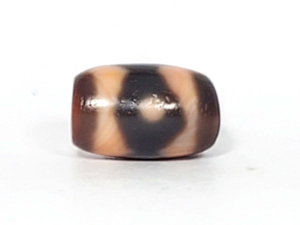 At-061926-3E2 Face A close angle, fine surface pitting, peach-cream zones visible, unretouched