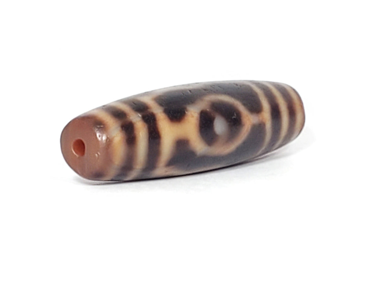 At-061926-3EEG angled tip A, vivid orange-red drill interior, terracotta end cap, unretouched