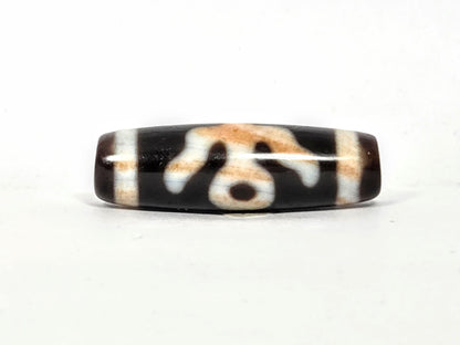 V-021326-BenBS vintage Benefactor dzi bead, third face rotated 180°, open arcs and lower dot, dark brown ground, unretouched.