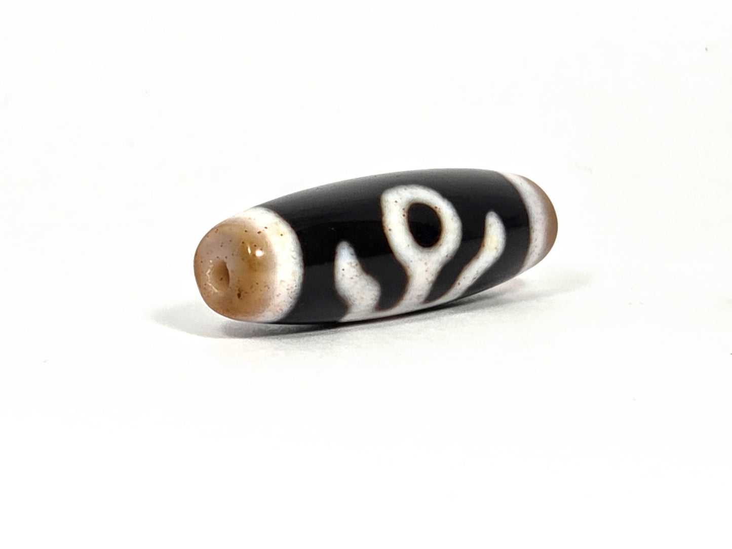 V-090126-BENBS vintage benefactor dzi drill end view two honey-brown tip agate banding unretouched