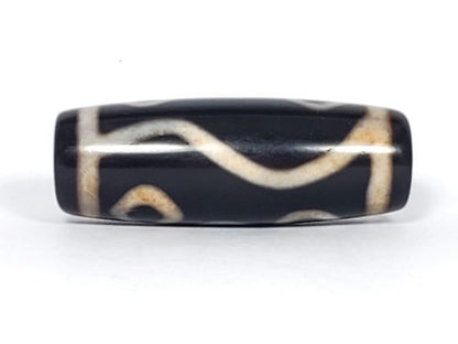 V-102723-6EBS Six Eye dzi bead, rotated view showing wave connecting lines on reverse face, unretouched