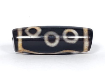 V-102723-6EBS Six Eye dzi bead, second face showing three eyes, pitch-black ground, unretouched