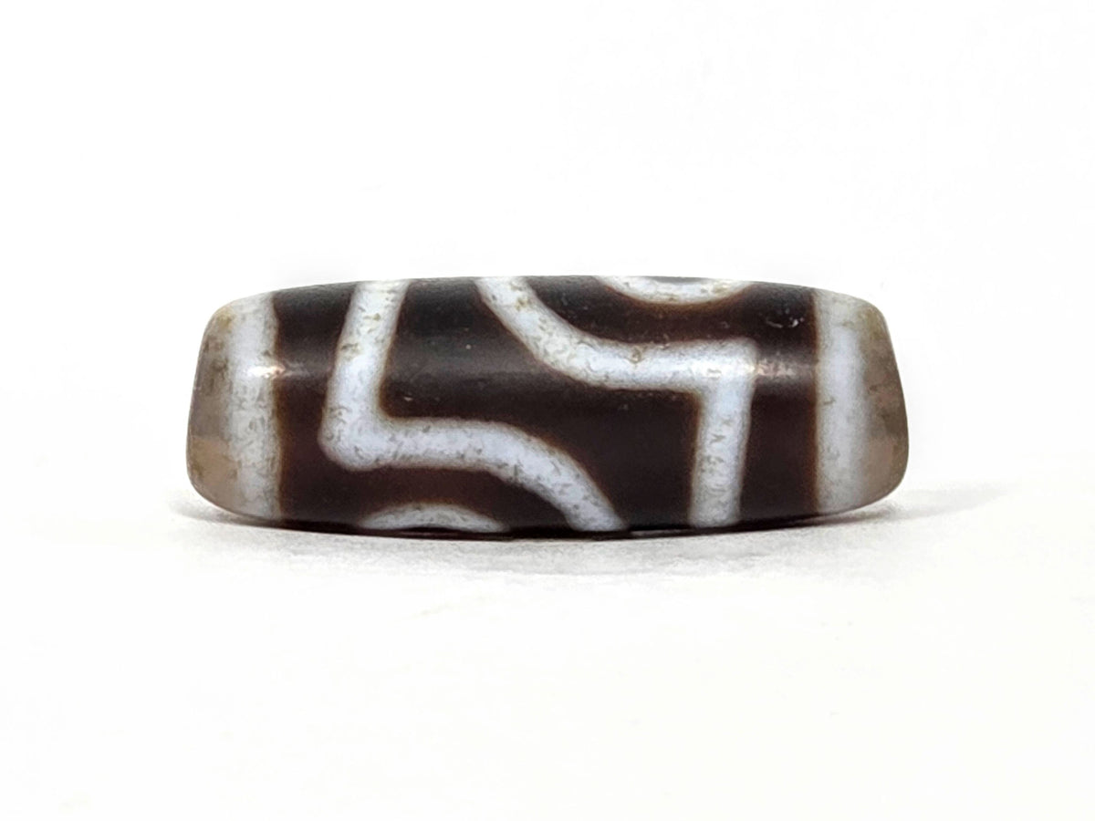 V-062126-2E dzi bead, opposite side profile, second eye face, unretouched