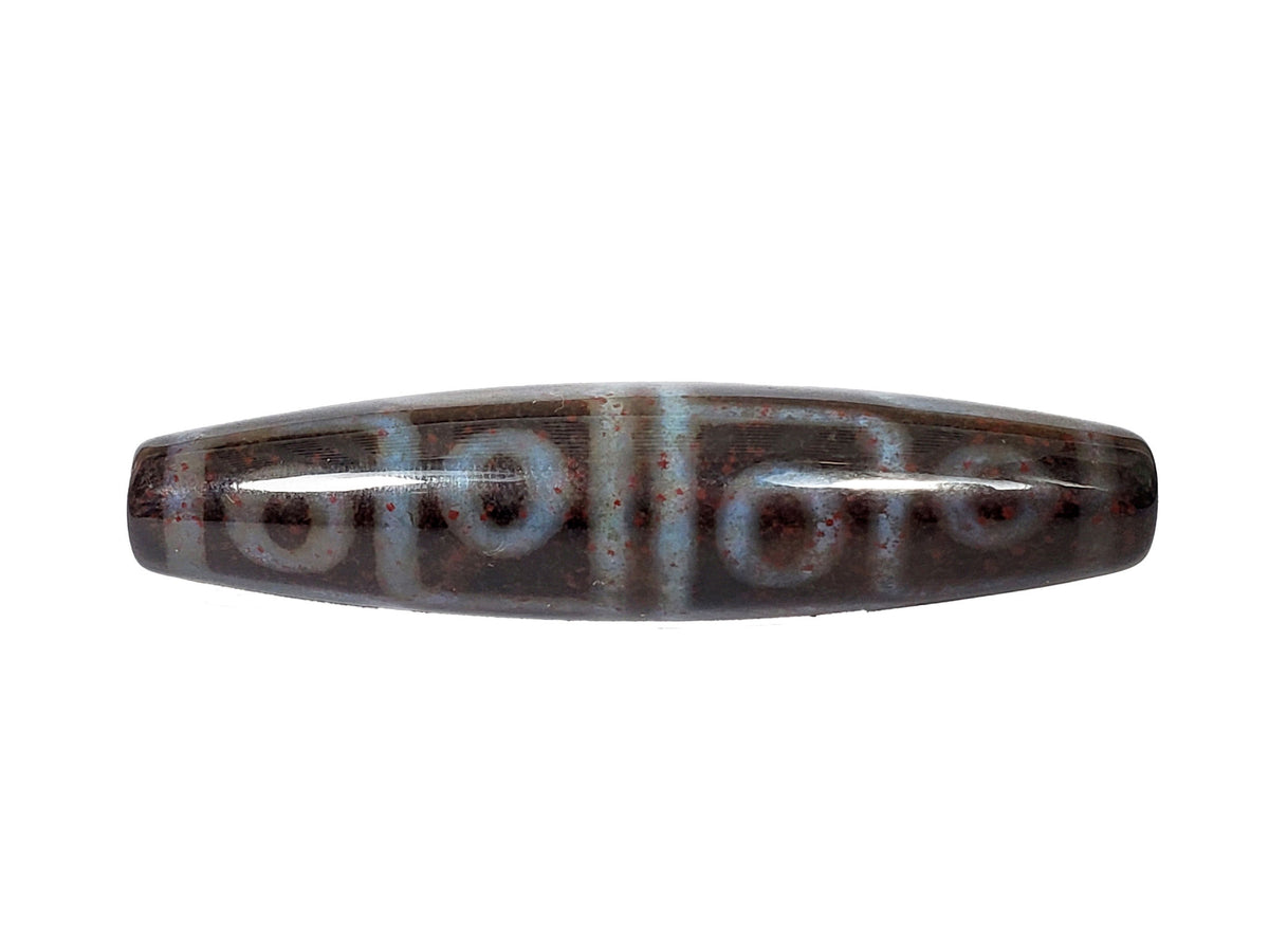 Twelve eye motif dzi bead with bloodspots, natural agate patina, polished brown surface, centered drill holes