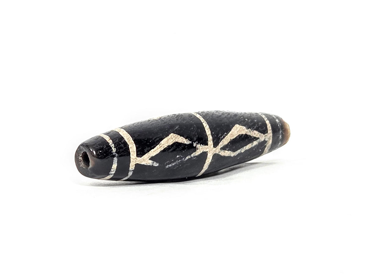 Ac-062426-3DS ancient three diamond spear agate dzi 49.1x12.2mm angled abrupt end small drill hole dark tip unretouched