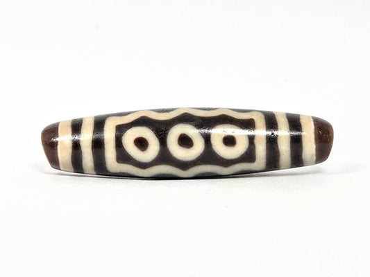 Ac-071026-7E ancient seven eye dzi 54.6x13.3mm dark brown agate three-eye face wavy border unretouched