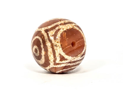 Ac-060126-4EHG, Heaven's Gate bracket motif and drilled pole hole, ancient carnelian four eye dzi sphere, unretouched