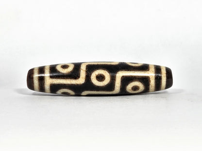Ac-091626-9E ancient nine eye dzi dark brown agate face B stacked eye rows S-curve connectors unretouched