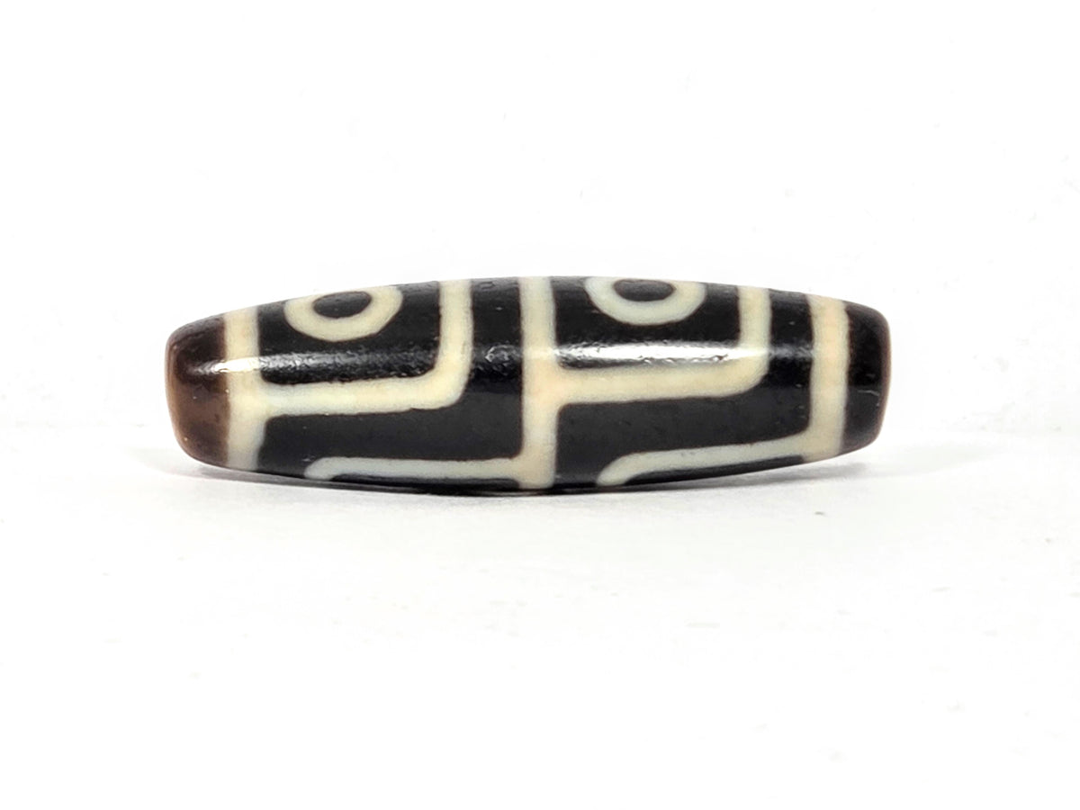 four eye dzi bead or making money fast