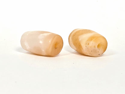 At-073026-WPair antique wave dzi pair top-down view drill holes pale & honey agate contrast unretouched