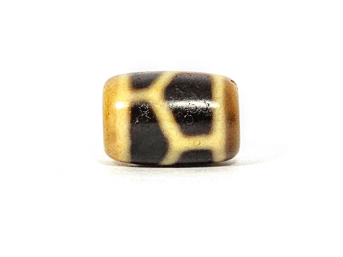 Antique longevity motif dzi bead, tan and dark brown agate, irregular network pattern, worn patina, barrel-shaped