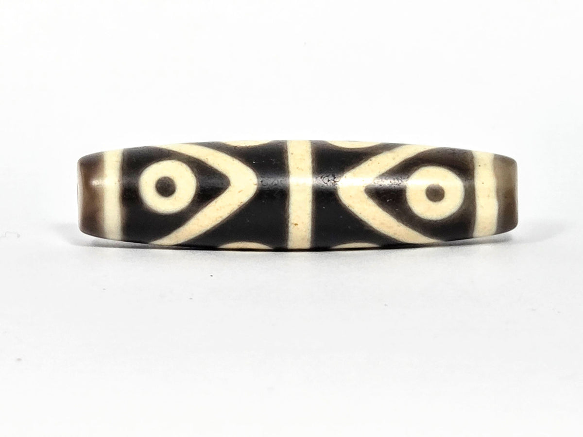 At-073026-8E antique eight eye dzi 50.3×12.5mm very dark brown agate face A four eyes 2x2 grid unretouched