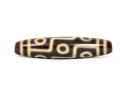 At-071326-9E2 face A, antique nine eye dzi 53.7×12.2mm, warm dark brown, surface pit disclosed, slender form, unretouched