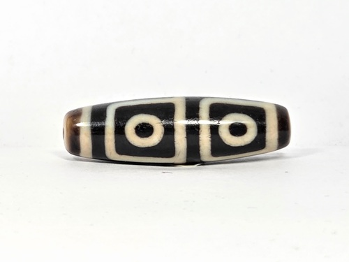 four eye dzi bead or making money fast