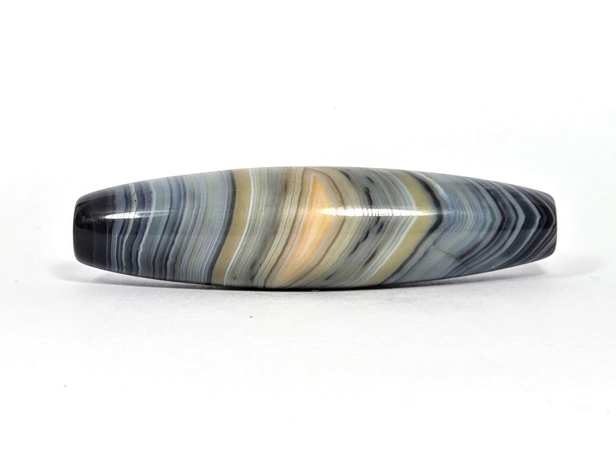 Naturally-formed one eye dzi bead, blue-grey and gold banded agate with striped patterns and polished surface