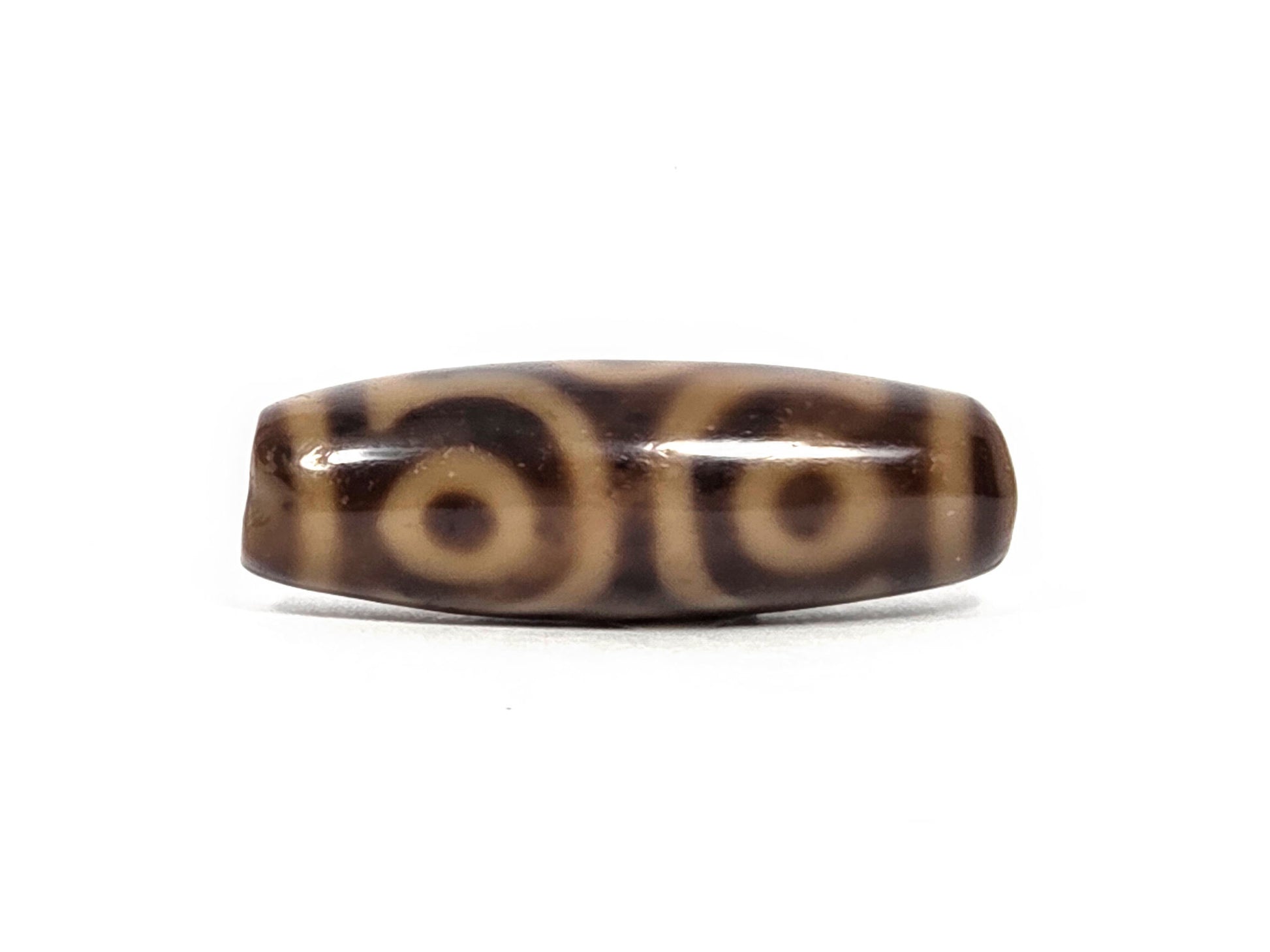 At-082326-6EMD antique six eye dzi bead reverse face three cream-ringed eyes warm dark brown agate unretouched