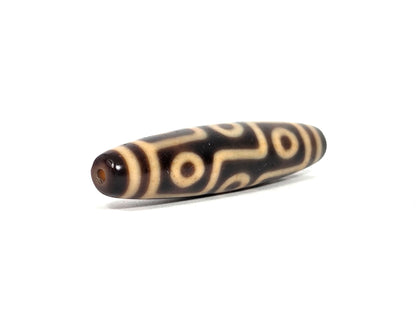 At-091626-9E antique Tibetan nine eye dzi angled drill end B dark brown agate clean hole unretouched