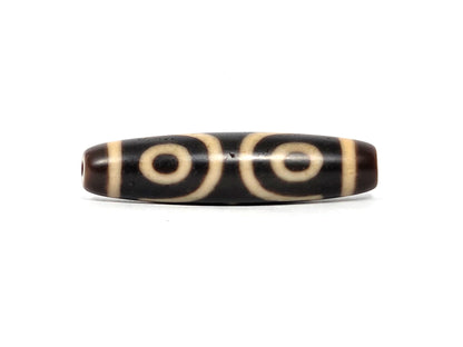 At-090226-3E2 antique three eye dzi dark agate face B two eyes side by side drill end visible, unretouched
