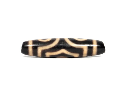 Three Eye Dzi Bead, black agate with cream striping, polished surface, 50.7mm
