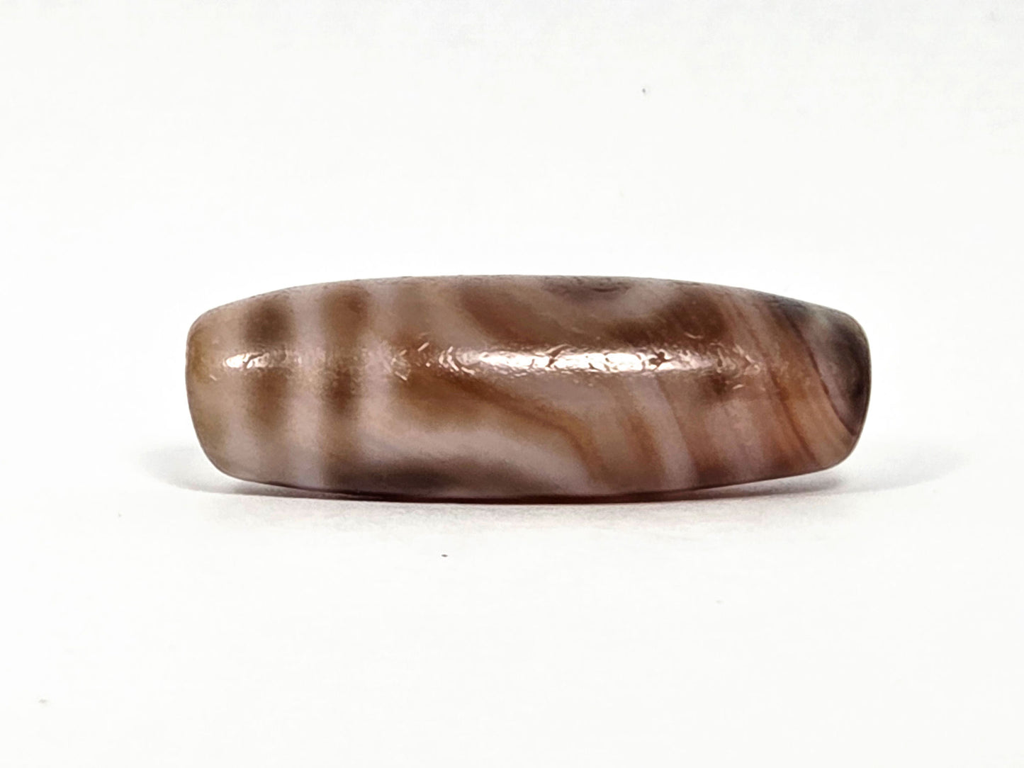 At-080426-2EBS antique two eye dzi bead 38.0×13.1mm, turn view opposite showing full banding character and body profile, unretouched