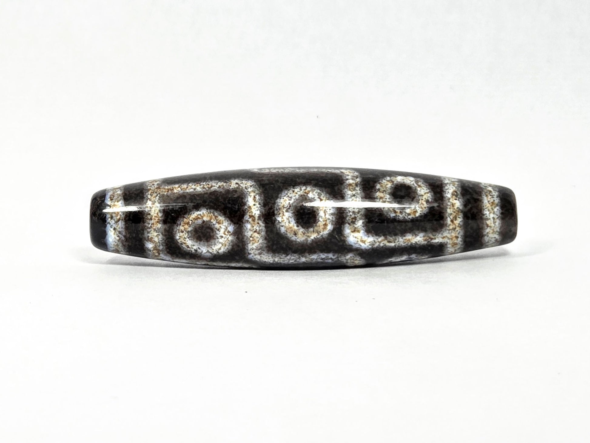 N-082326-9EBS new nine eye dzi bead 60x14.4mm pitch-black agate bloodspots front face unretouched