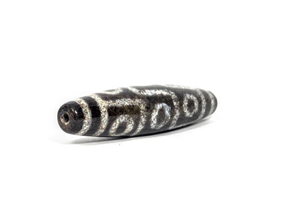 N-082326-9EBS new nine eye dzi bead drill end view two fusiform taper pitch-black agate unretouched