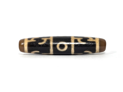 N-090526-3EGRP new Guru Rinpoche three eye dzi black agate third rotation cream motif lines low angle, unretouched