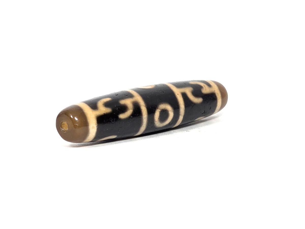N-090526-3EGRP new Guru Rinpoche three eye dzi black agate angled drill end honey-brown cap, unretouched