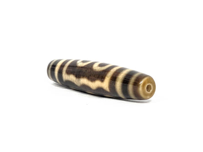 N-090126-5E new five eye dzi drill end view one warm honey-brown tip agate unretouched