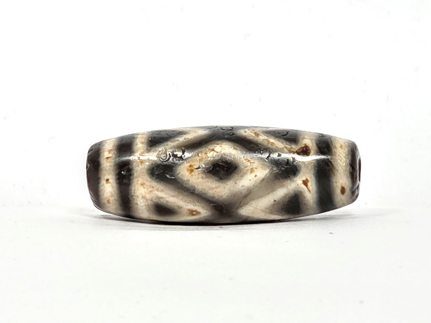 Full-length profile of ancient Three Diamond Eye and Tiger Tooth Dzi bead — 36.3mm × 13.1mm, warm tan agate, unretouched