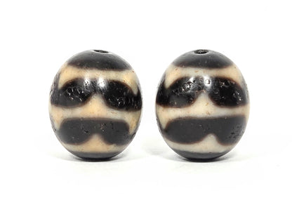 V-060826-DWP2 hero pair front face, pitch-black ground, sandy-cream double wave bands, 20.4mm, unretouched