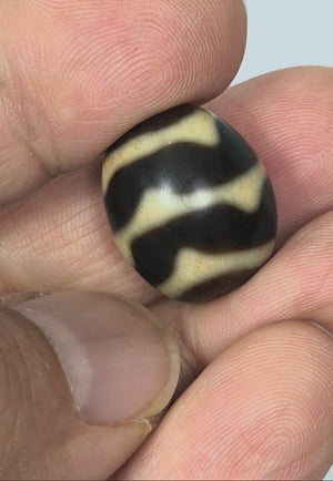 Antique Tibetan Round Dzi Bead featuring Double Wave Motif (110325)