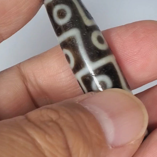 Ac-061826-12E2 rotating 360°, 12-eye ancient agate dzi, 51.9×12.9mm, dark chocolate-brown, unretouched footage