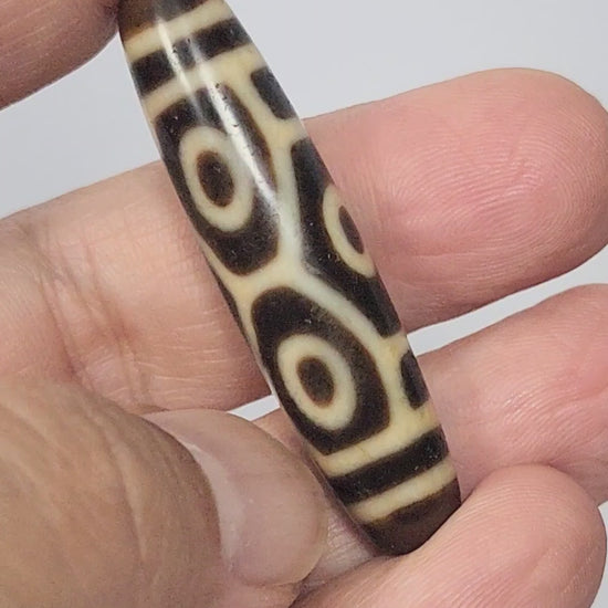 Antique Tibetan Six Eye Naga Dragon Eye dzi bead 48.5mm rotating 360 degrees showing all four faces, At-050725-6EN3