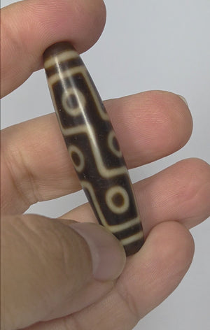 Antique Tibetan Dzi Bead Adorned with the Nine Eye Motif (TiD-Ant-200-NE-102225)