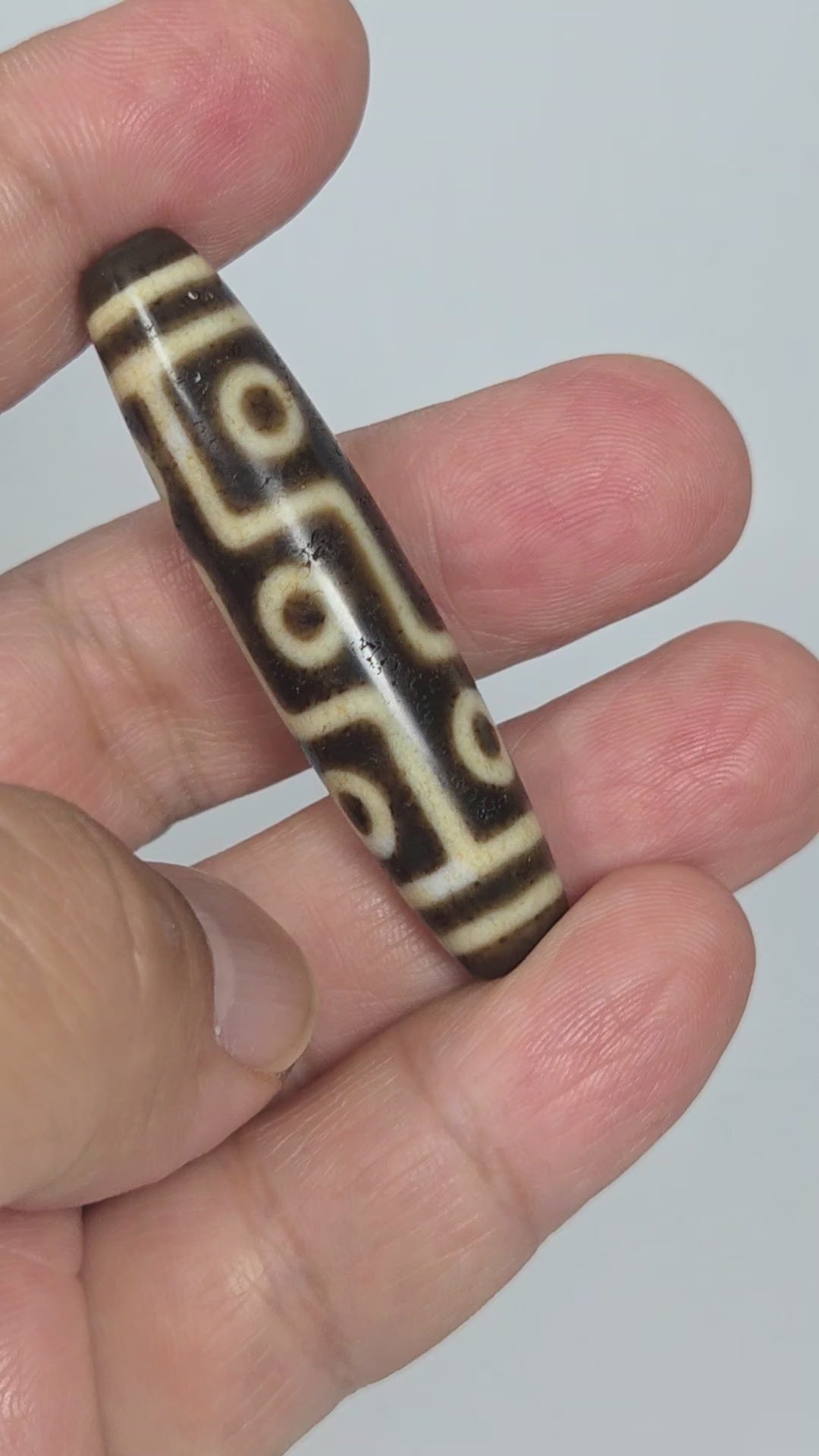 Ac-091626-9E ancient nine eye dzi 53.8x12.5mm dark brown agate rotating view all faces 500-800 years unretouched