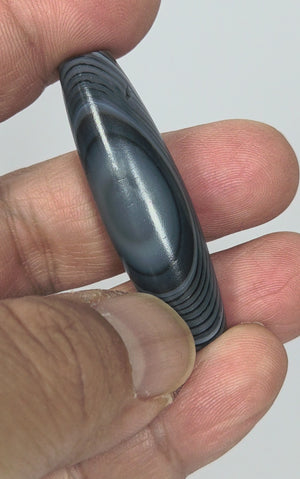 Antique Dzi Bead featuring Naturally Formed One Eye Motif (010126)